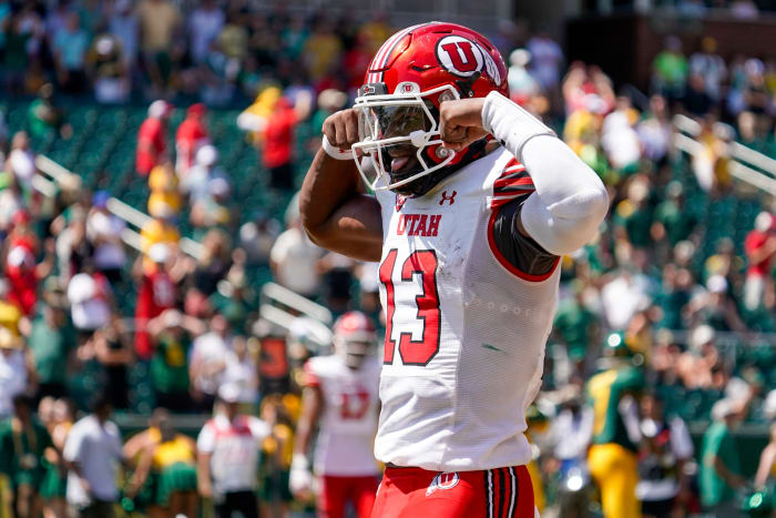 Sep 9, 2023; Waco, Texas, USA; Utah Utes quarterback Nate Johnson (13) carries the ball for a 11-yard touchdown against the Baylor Bears during the second half at McLane Stadium. Mandatory Credit: Raymond Carlin III-USA TODAY Sports